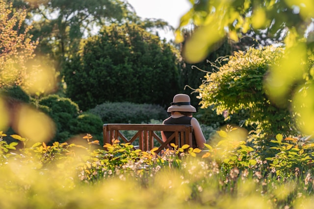 woman sitting in garden